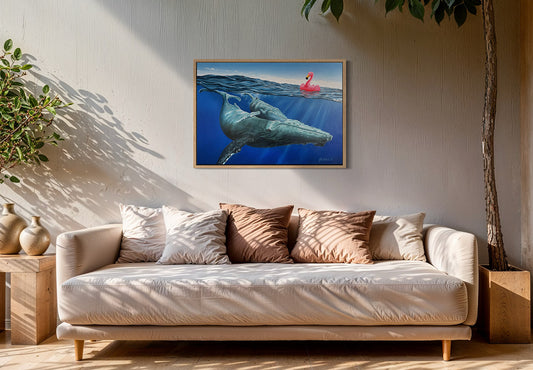 Ocean oil painting of a whale and calf underwater with a pink inflatable flamingo drifting above, displayed in a Mediterranean-style outdoor living area